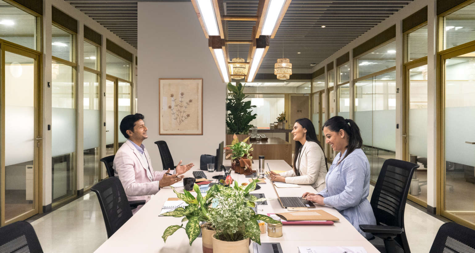 How can shared workspaces help startups grow?